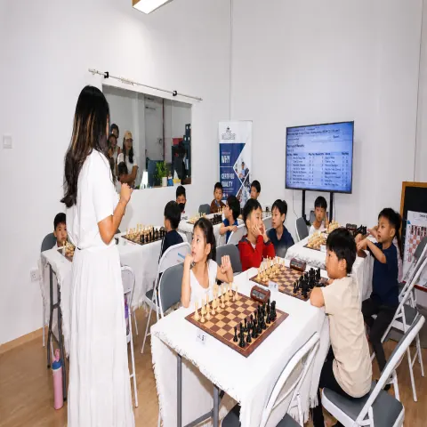 Students receiving focused instruction in a chess class