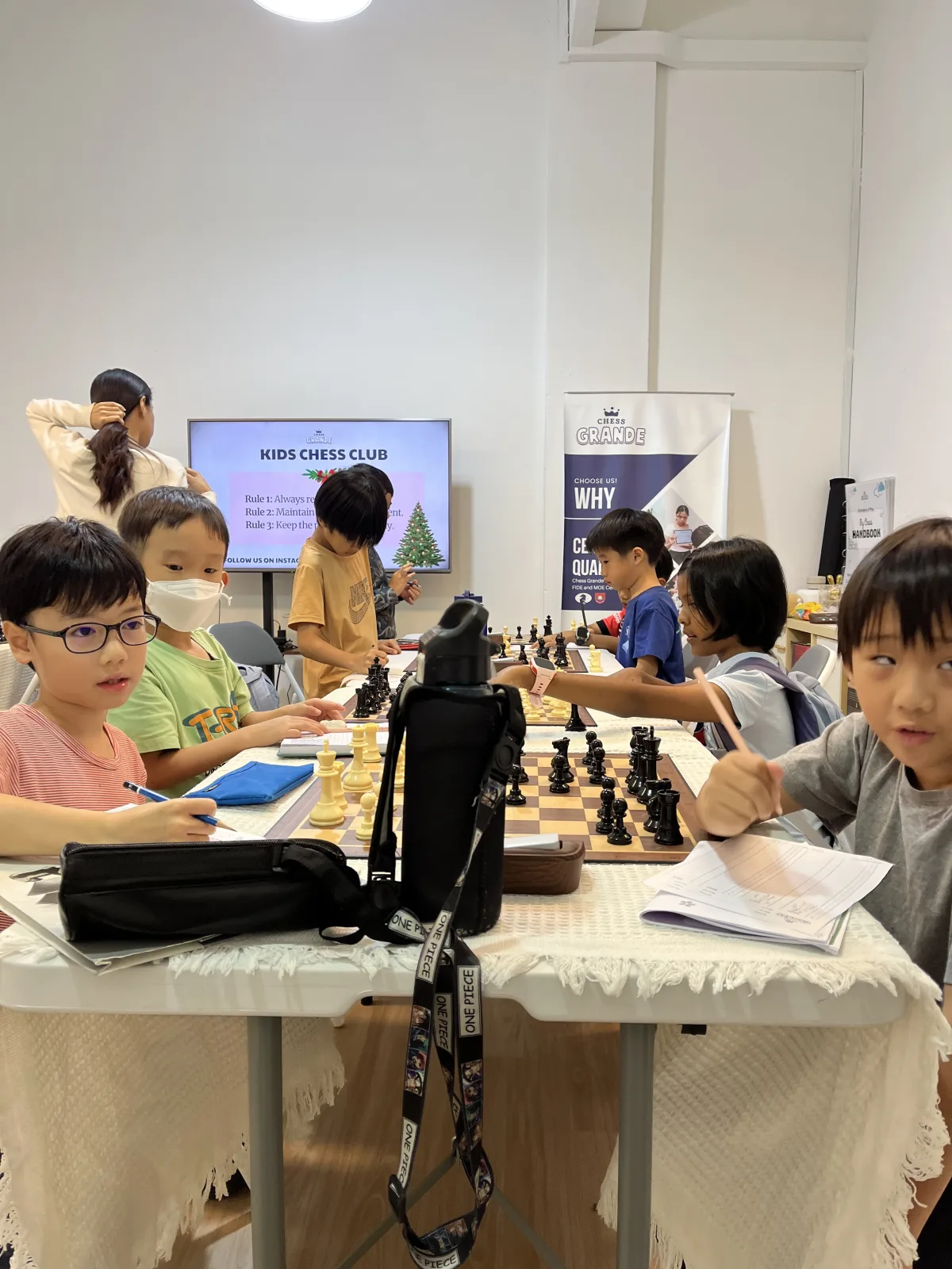Chess club students learning and playing together