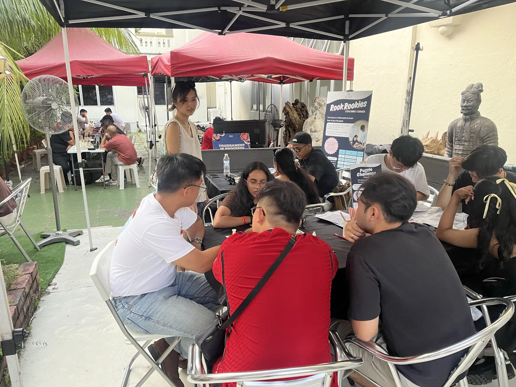 Visitors enjoying chess activities at the Aliwal World Chess Day Celebration
