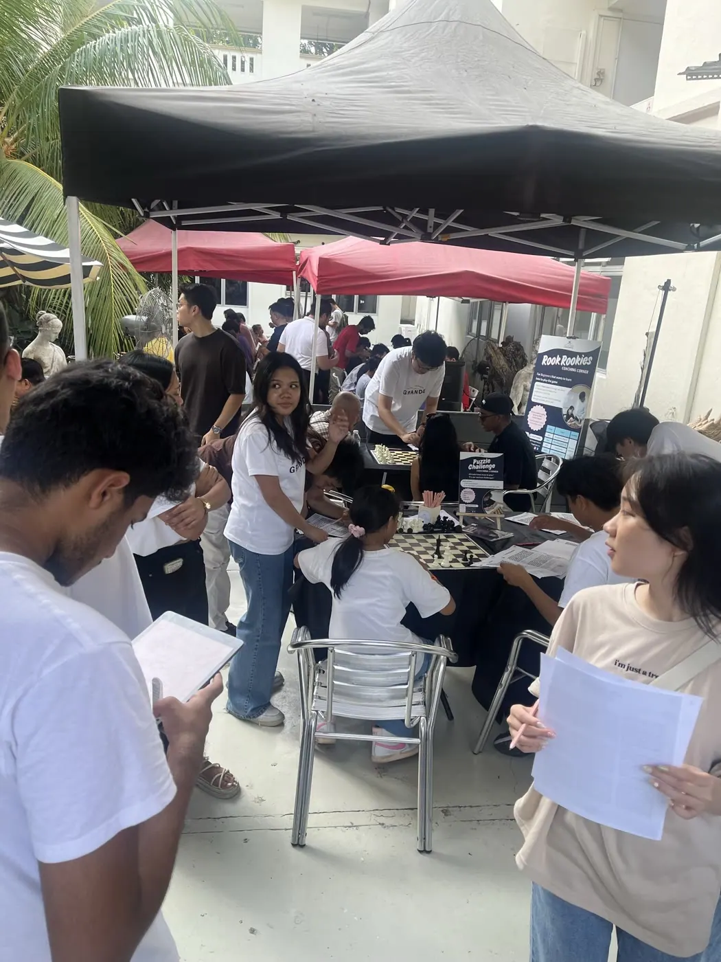 Visitors gathered under the event tents at Aliwal World Chess Day