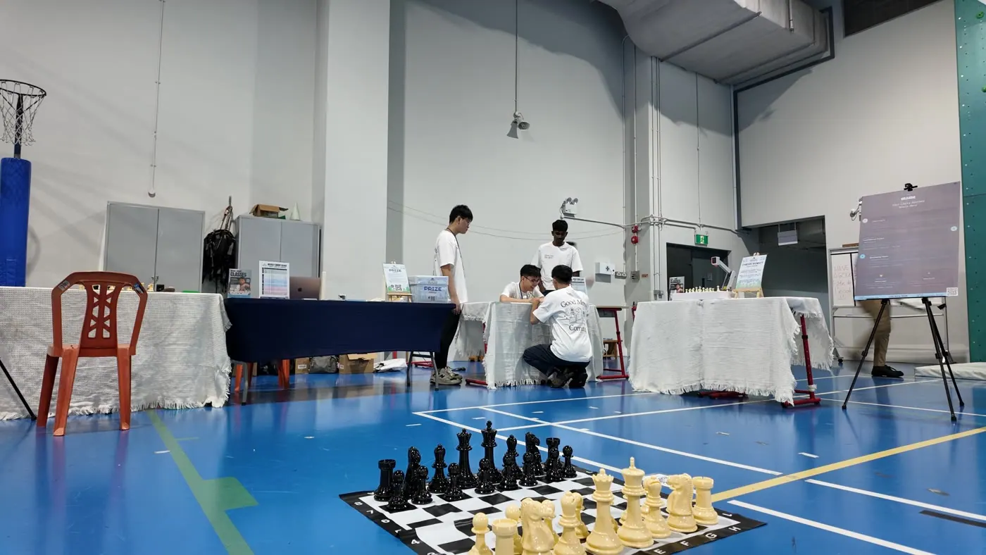 A chessboard welcoming visitors to the Chess Grande activity area at Fête de l’École