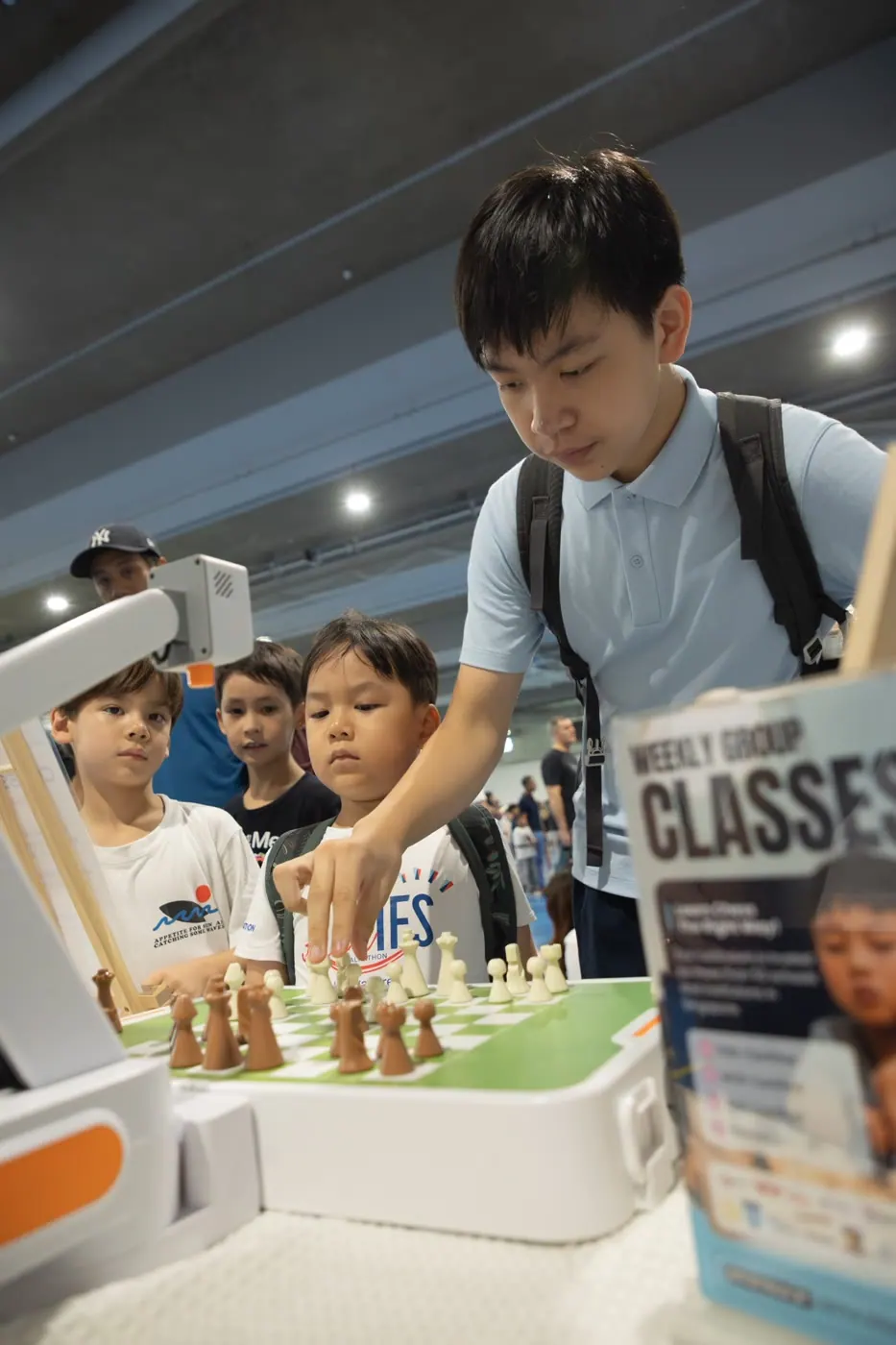 A pencil marking moves on a Chess Grande puzzle worksheet