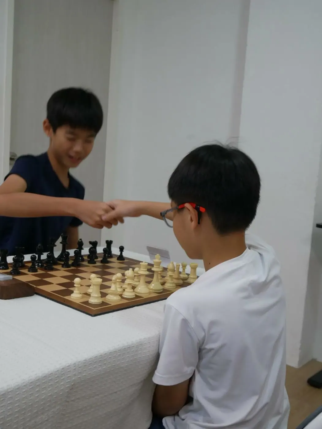 Two young opponents playing a quiet meetup game
