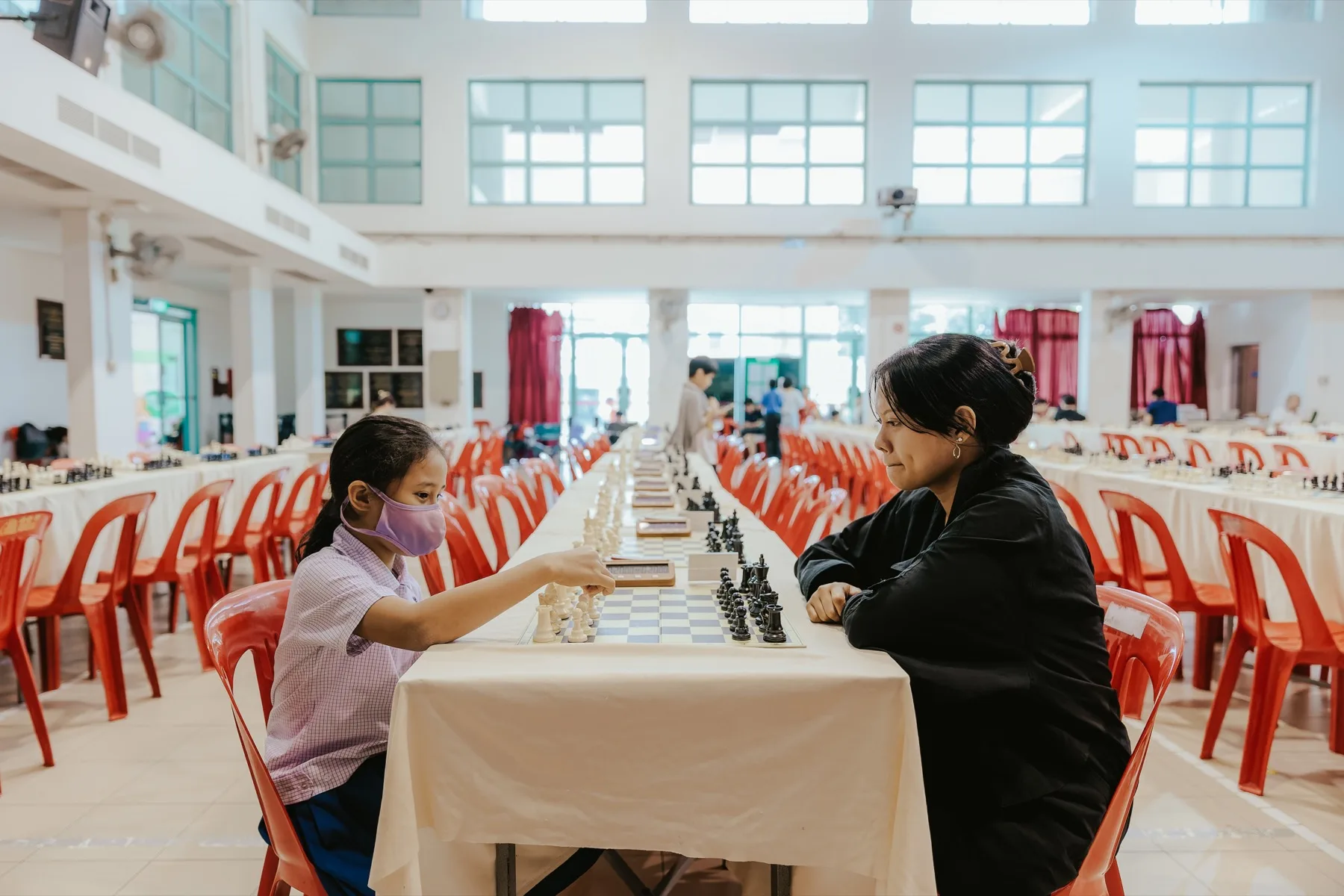 A young player making a move at the Toa Payoh West Community Club tournament