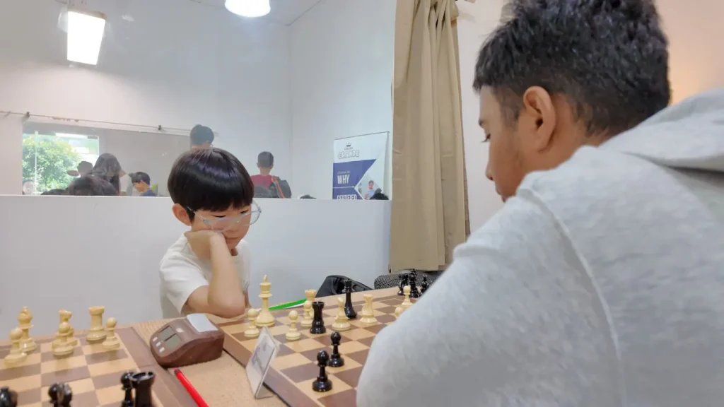 Two players focus on their game during the 4th Chess Grande Invitationals.